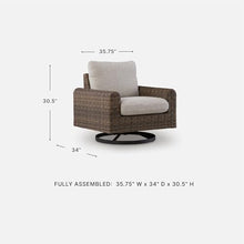 Signature Design by Ashley Angel Island Outdoor Rocking Chair, 360-Degree Swivel Lounge Comfort, Aluminum Frame Resin Wicker With Nuvella Fabric For Patio Porch Deck
