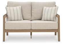 Signature Design by Ashley Hallow Creek Cottage Weather Resistant Outdoor Loveseat with Cushion and 2 Throw Pillows Light Brown & Beige