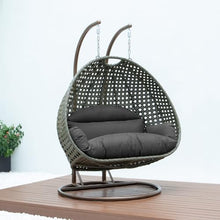 LeisureMod 2-Person Wicker Egg Chair, Hanging Swing Chair for Indoor & Outdoor Use with Cushions, Beige Steel Stand, UV-Resistant, Hammock Lounge Seat for Patio, Porch, or Bedroom (Dark Grey)