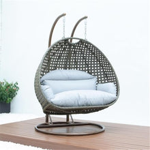 LeisureMod 2 Person Wicker Egg Chair Outdoor Indoor Bedroom Patio Hanging Lounge Swing Hammock Chairs with Beige Stand and UV Resistant Cushions, Light Grey