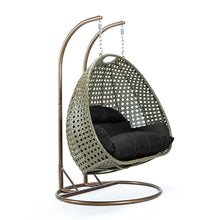 LeisureMod Black Wicker 2 Person Egg Swing Chair with Beige Stand and Cushions – Double Hanging Hammock Lounge for Patio, Indoor & Outdoor Use