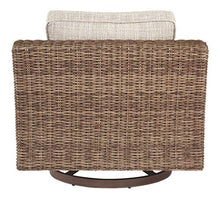 Signature Design by Ashley Beachcroft Outdoor Swivel Wicker Patio Lounge Chair Brown Beige