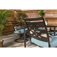 Hanover Montclair 7-Piece Outdoor Dining Set with 6 Swivel Rockers and Blue Cushions