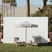Business & Pleasure Co. Market Umbrella ~ 7' White Boho Fringe Outdoor Patio Umbrella, UPF 50+, 1.5" Wood Pole, 7’W x 8.5’H, Lauren's Navy Stripe