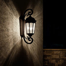 Kichler Courtyard 3-Light Outdoor Wall Light with Clear Seeded Glass Rubbed Bronze
