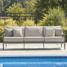 Signature Design by Ashley North Island Modern Nuvella Weather Resistant Outdoor Sofa with Cushion, Sloped Arms and 4 Accent Pillows, Gray