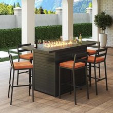LeisureMod Chelsea 1 Bar Height Fire Pit Table & 6 Bar Chairs Orange Cushions, 50,000 BTU Fire Pit Dining Table Set, Powder-Coated Aluminum Patio Dining Set, Removable Olefin Covers