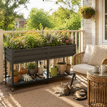 2-Tier Elevated Metal Wicking Garden Bed with Lockable Wheels & Storage Shelf, Dark Gray Staggered Self-Watering Planter. Built-in tank feeds plants via capillary action for veggies, herbs, flowers