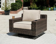 Signature Design by Ashley Coastline Bay Casual Outdoor Swivel Lounge with Cushion, Beige & Dark Brown