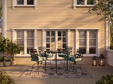 Hanover Montclair All-Weather 5-Piece Outdoor Dining Set with Cushioned Swivel Chairs and Stamped-Top Table Blue