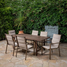 Hanover Fairhope 7-Piece Outdoor Dining Set with 6 Padded Sling Chairs and Trestle Table Tan