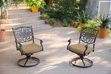 Hanover Traditions 7-Piece Patio Dining Set with 6 Swivel Rocker Chairs and Tan Cushions