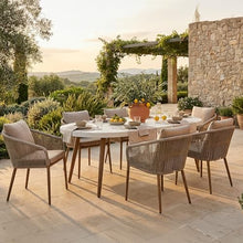 Benzara Yami Outdoor Dining Table, 80 Inch Oval Faux White Stone Top, Brown