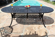 GrandPatioFurniture.com CBM Elisabeth Collection Cast Aluminum 9 Piece Dining Set with 8 Swivel Rockers Black Brown