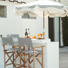 Business & Pleasure Co. Market Umbrella ~ 7' White Boho Fringe Outdoor Patio Umbrella, UPF 50+, 1.5" Wood Pole, 7’W x 8.5’H, Lauren's Navy Stripe