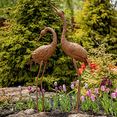 Zaer Ltd. Set of 2, Pair of Large Metal Dancing Herons in a Distressed Painted Finish (Set of 2 - Looking Forward and Back, Aged Brown)