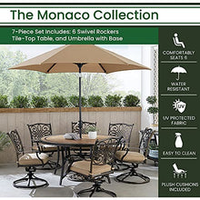 Hanover Monaco 7-Piece Outdoor Patio Dining Set with 6 Cushioned Swivel Rocker Chairs, 60" Round Table, Umbrella & Base, Tan