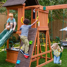KidKraft Raptor Trail Wooden Swing Set with Twisty Ladder, Wavy Slide, Rock Wall Brown