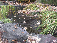 Green Vista 3/4 Inch Mesh Quality Landscape Pond Netting - 30' x 100' with 56 Steel Stakes