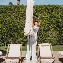 Business & Pleasure Co. Market Umbrella ~ 7' White Boho Fringe Outdoor Patio Umbrella, UPF 50+, 1.5" Wood Pole, 7’W x 8.5’H, Lauren's Pink Stripe